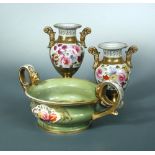 A pair of Miles Mason two handled vases, circa 1810, the shouldered ovoid bodies painted with panels