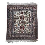 A caucasian Perepedil rug, with a cream field of bold design and typical ram-horn motifs 140 x 106cm