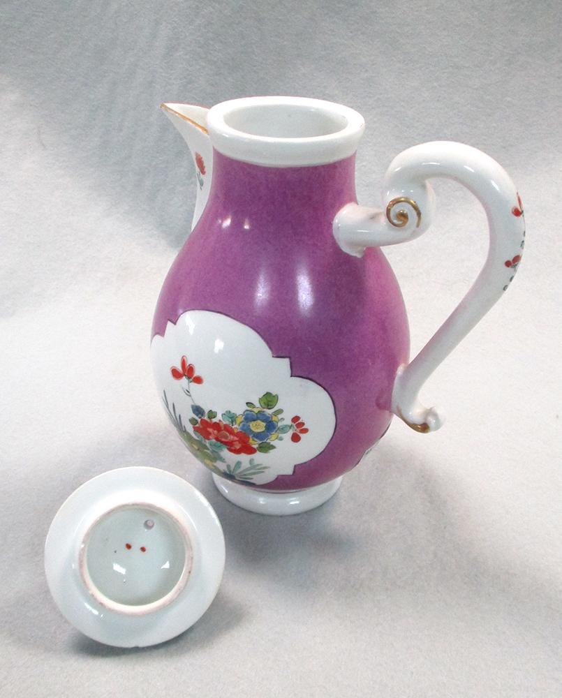 An 18th century Meissen purple ground milk jug and cover, circa 1740, the body reserved with two - Image 2 of 4