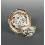 Two Meissen 'hausmalerei' tea bowls and a saucer, circa 1740 , decorated at the Ferner workshop, the