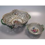 A Meissen style two handled pierced basket, the centre painted with a musical group; a small Dresden