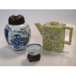 A group of three Chinese ceramics including a Ginger Jar, a little cup and a teapot, to include a