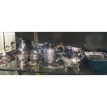 A collection of silver plated items including an entree dish, three sauce boats, two cream jugs, a