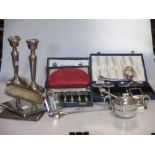 A collection of silver to include: A Guild of Handicrafts preserving spoon, a cased seal top
