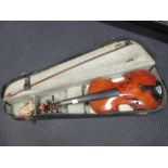 A 19th century violin, one piece back, some old cracks to the top, in need of attention, cased