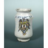 A Talavera de la Reina faience armorial albarello, circa 1660, the cylindrical body with instepped