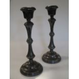 A pair of silver candlesticks by Broadway & co, Brimingham 1958, loaded (2)