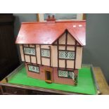 A 20th century hand-built dolls house and contents