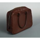 Hermès, Paris, a 'Plume 32' leather handbag, the 32cm bag in chestnut brown leather with original