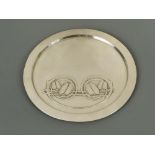 Archibald Knox for Liberty & Co., a Tudric pewter letter or card tray, No. 0163, of circular form