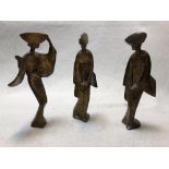 Three 20th century gilt steel stylised figures, each in full length dress with hats, unmarked (3)