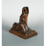 An early 20th century carved wood lamp base modelled as a lady and a sphinx, the top of her head