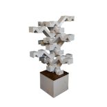 Possibly the work of Michael Hale, Extending Forms, a large 20th century abstract sculpture in white