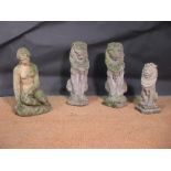 A pair of reconstituted stone guard lions, a smaller lion and a seated figure of a maiden (4)