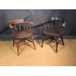 A Victorian ash and elm smokers bow armchair and another similar (2)