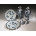 Four Chinese blue and white late 18th century export plates, a pair of blue and white vases and a