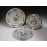A large Chinese export late 18th century plate and three similar plates (4)