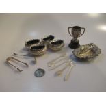 Four silver salts, small tongs, miniature cup on stand, etc