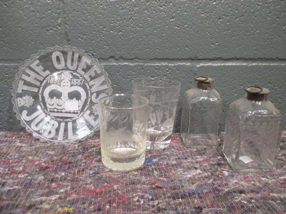 A 19th century memorial glass, etched with a classical urn and a fanciful bird; two 19th century