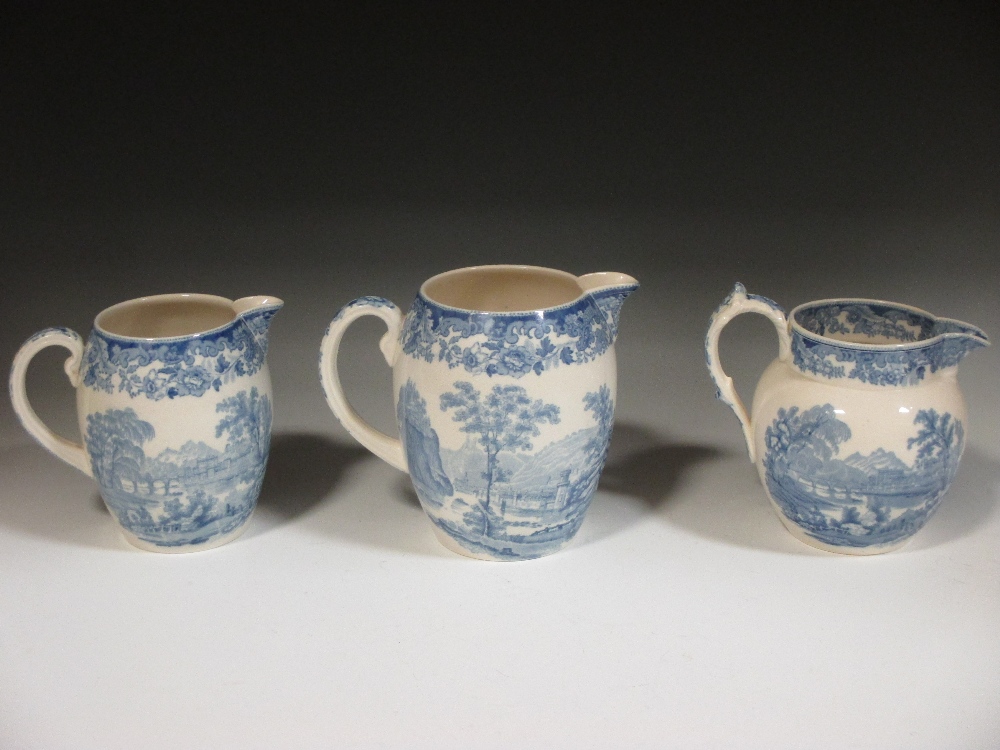 Three Spode blue and white jugs (17cm the tallest)