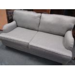 A modern and little used DFS grey sofa