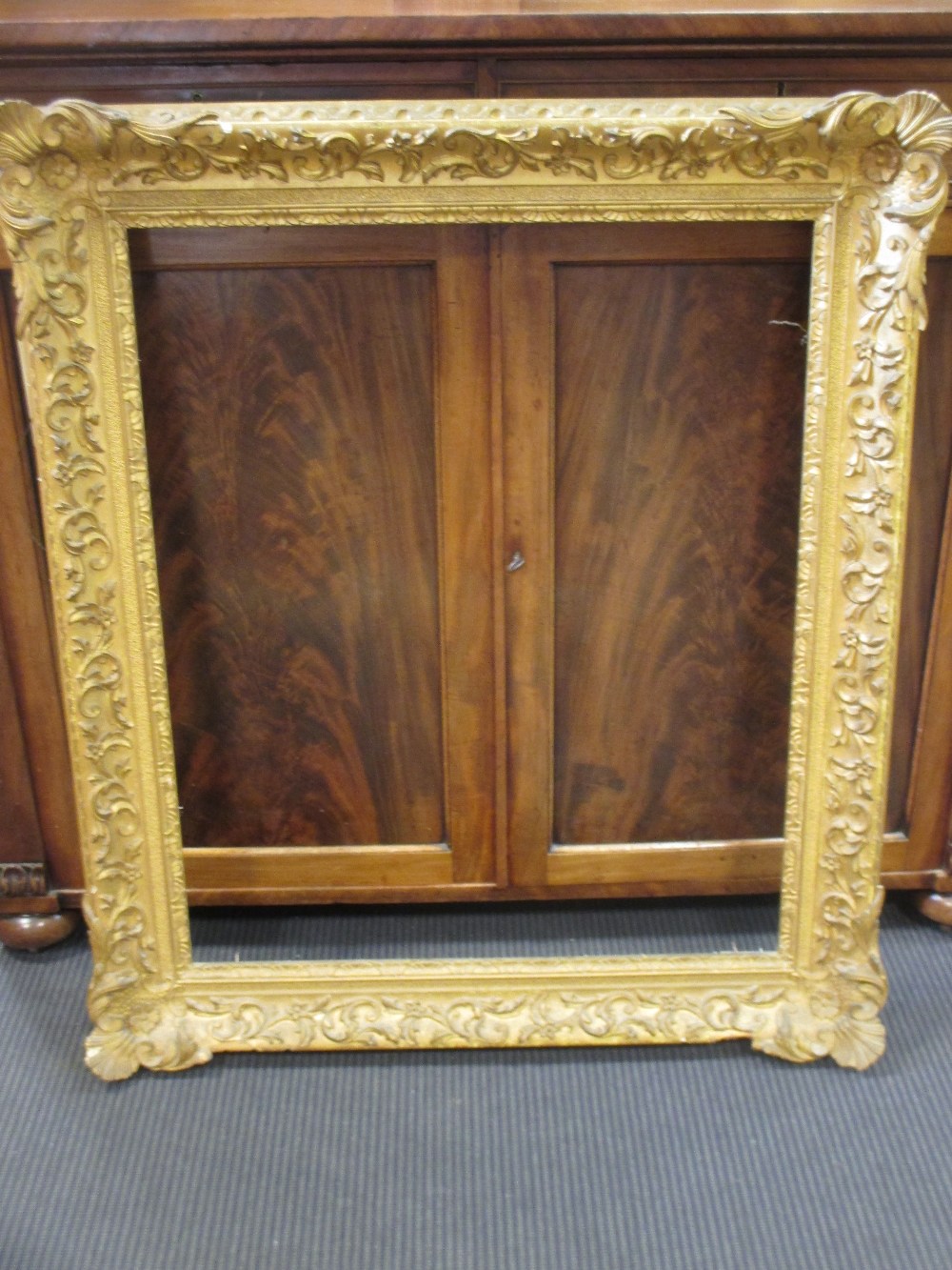 A gilt and gesso moulded picture frame, sight size 75 x 62cm - Image 2 of 2