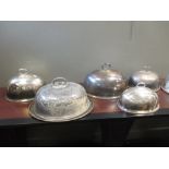 A quantity of silver plated meat covers
