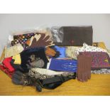 Haberdashery items including a pair of unused Prada gloves in packaging, 3 hair combs, scarves, etc