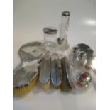 A silver six piece dressing table set, together with 6 silver topped glass dressing table jars (12)