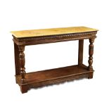 A 17th century and later oak console table, with faux marble top, palmette carved frieze and open