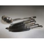 A quantity of silver plated cutlery including a soup ladle