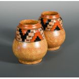 A pair of Charlotte Rhead vases, of gourd form with geometric design in orange and black to a