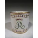 An 18th century English porcelain coffee can, possibly Derby, enamelled with the initial 'R'