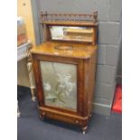 A Victorian walnut and inlaid side cabinet, with mirrored back above glazed door enclosing