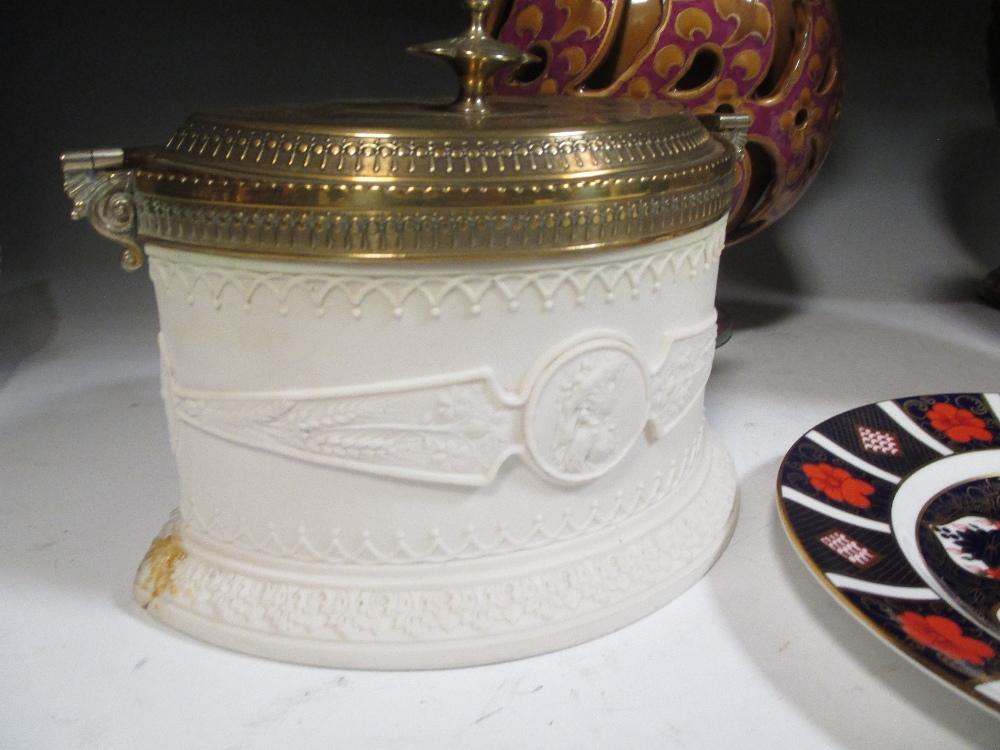 A Royal Doulton 'Nelson' beaker, a parian elliptical biscuit box with brass mounts (A/F) ; a Zsolnay - Image 2 of 3