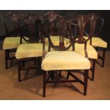 A set of eight Hepplewhite style shield back mahogany dining chairs including two elbow chairs (8)