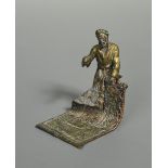 Attributed to Bergman, an Austrian cold-painted bronze model of a carpet seller,the standing