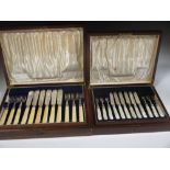 A set of twelve George V silver dessert knives with mother of pearl handles, and twelve matching