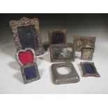 Seven various silver photograph frames, a watch frame and plated eastern double photo frame (9)