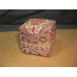 A Kelim upholstered box stool with rope decorated top on four casters, 56 x 54cm