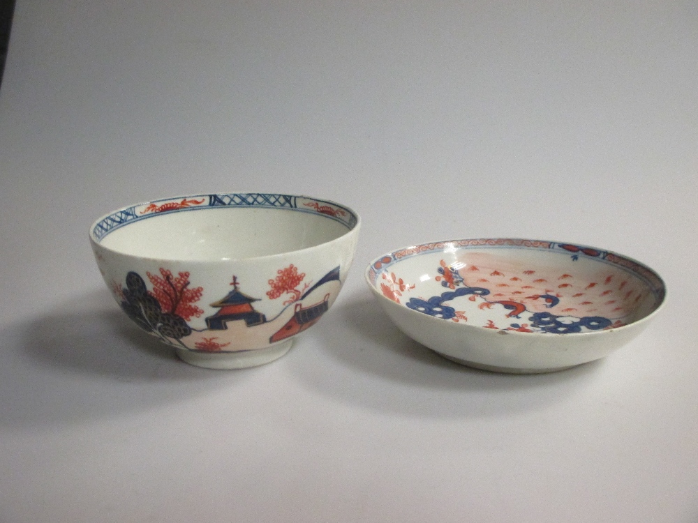 A Lowestoft tea bowl and saucer