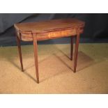 A Sheraton period mahogany breakfast card table with rosewood crossbanded border, and boxwood