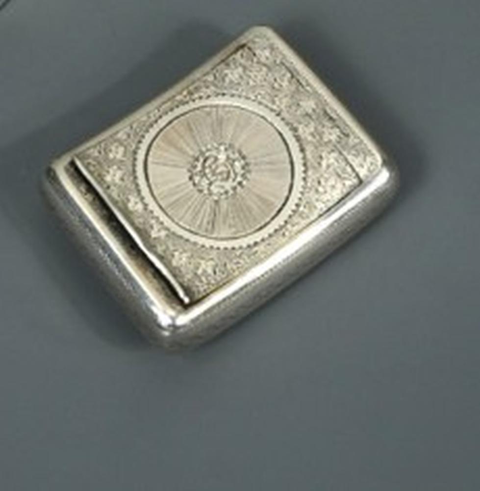 A George IV silver snuffbox by Joseph Wilmore, Birmingham 1820, of rectangular concave form, heavily