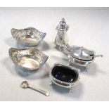 A 20th century silver three piece condiment set by Garrard & Co and a pair of pin trays, the