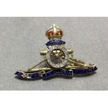 An early 20th century diamond and enamel Regimental brooch for the Royal Artillery, with red and