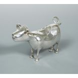 A 20th century Schuppe style cow creamer, indistinctly marked to the belly, possibly Dutch,