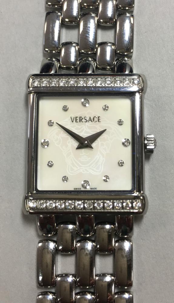 Versace - A lady's 'V' stainless steel wristwatch, the rectangular signed mother of pearl dial