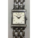 Versace - A lady's 'V' stainless steel wristwatch, the rectangular signed mother of pearl dial