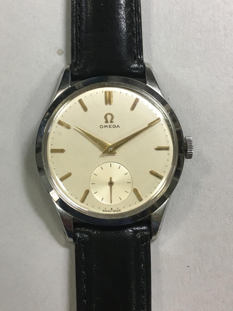 Omega - a gentleman's stainless steel wristwatch, the circular signed cream coloured dial with