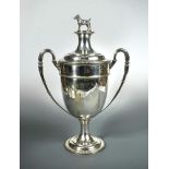 A Victorian silver two handled trophy cup and cover, by HC Freeman & Co, London 1900, of plain urn